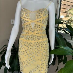 Yellow beaded formal short dress silver jewels. Sean Collection